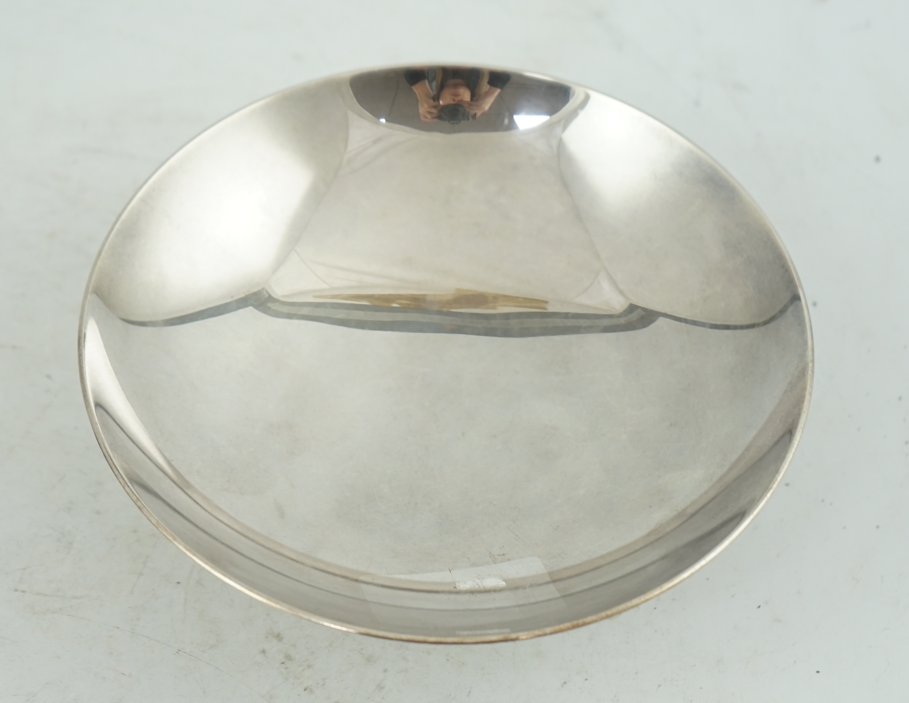 A heavy Japanese silver stem dish, early 20th century, stamped mark ‘jungin’ (pure silver)